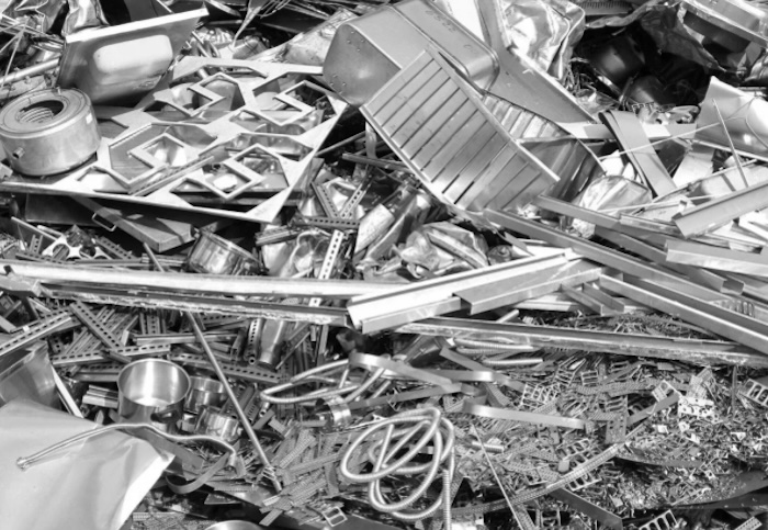 Scrap stainless steel parts and cut metal pieces for recycling