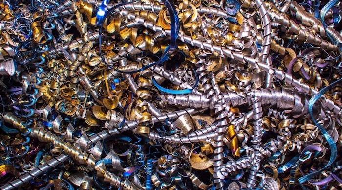 Pile of aluminum and copper shavings representing nonferrous scrap metals